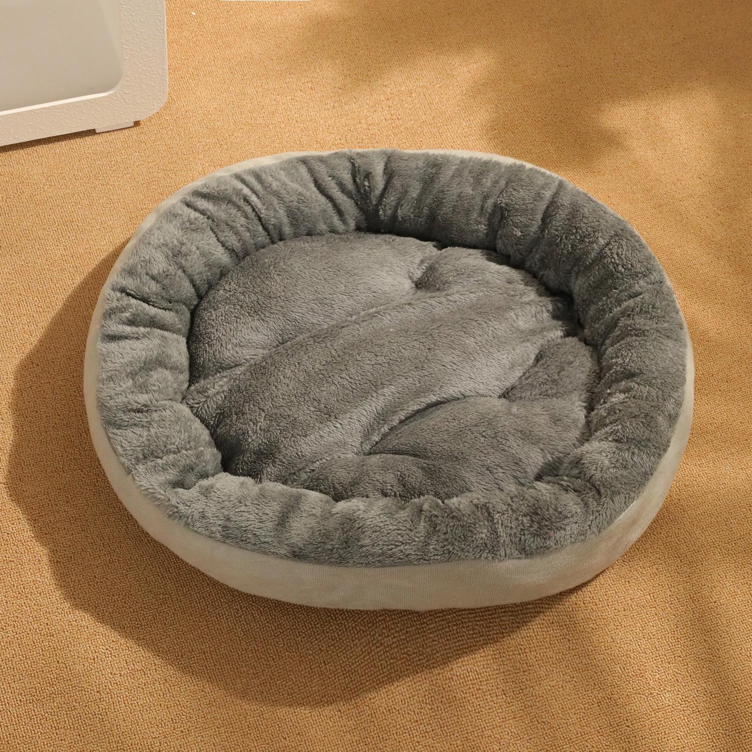 

Kennel winter thickened oval nest dog cushion pet bed winter warm cat litter winter S size 47 * 42 * 10cm (applicable within 5 kg) сірий колір