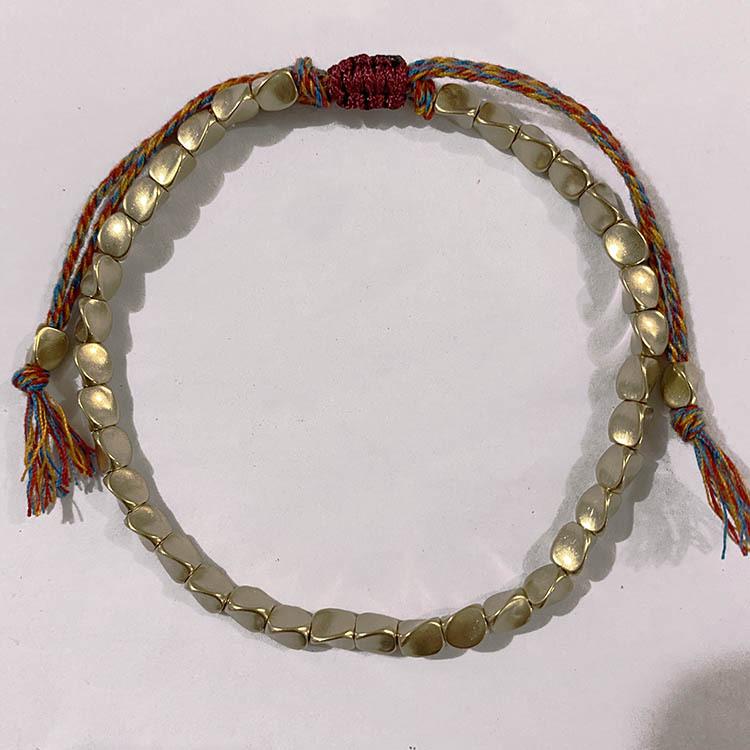 Women's Adjustable European Style Woven Rope Bracelet with Copper Beads and Tassel