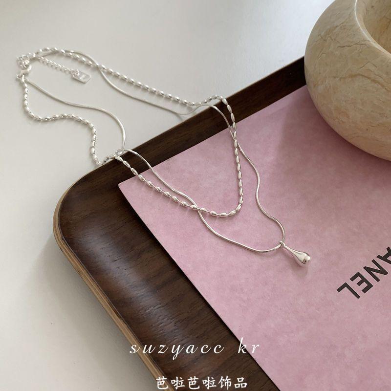 Imitation pearl broken silver bow necklace temperament light luxury high sense versatile lady natural pearl collarbone chain