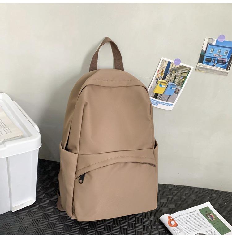 School bag 2025 new solid color simple backpack college student Korean version school bag versatile simple casual fashion backpack