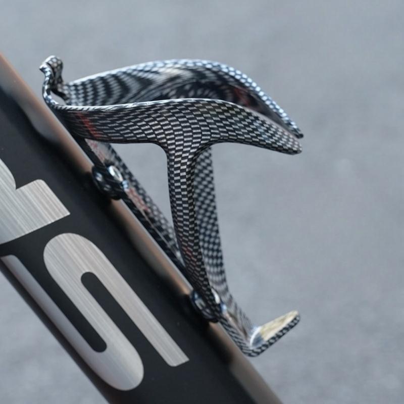 Universal ABS Bike Water Bottle Holder with Carbon Texture - Anti-Slip Cycling Cup Cage for Mountain Road Bikes Accessories