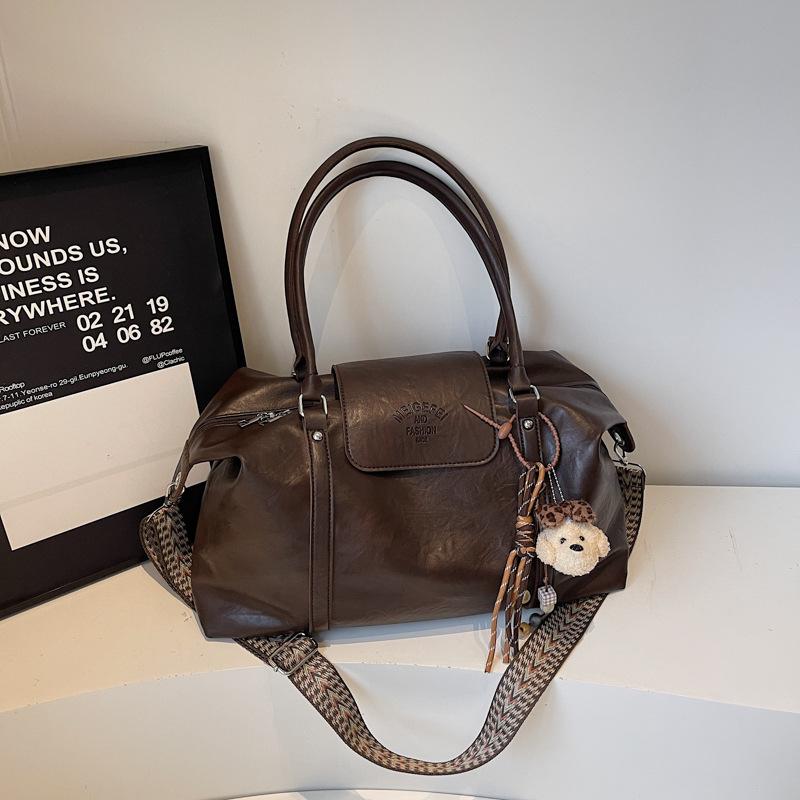 

2025 autumn new large-capacity commuter tote bag women s fashion simple niche foreign style underarm shoulder bag no pendant темно-коричневого кольору
