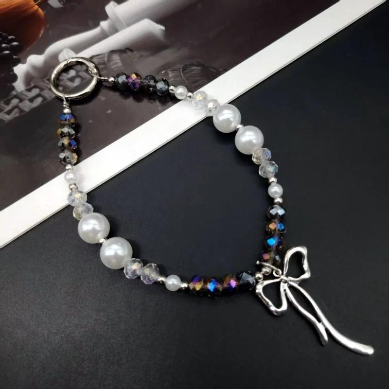 

Elegant Butterfly Pearl Phone Chain, High-End Crystal Beaded Wrist Strap Keychain, Anti-Loss Hanging Decoration for Women