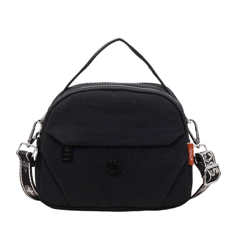 

Chic Canvas Crossbody Bag: Lightweight, Stylish Round Design – Perfect for Shopping and Casual Outings.