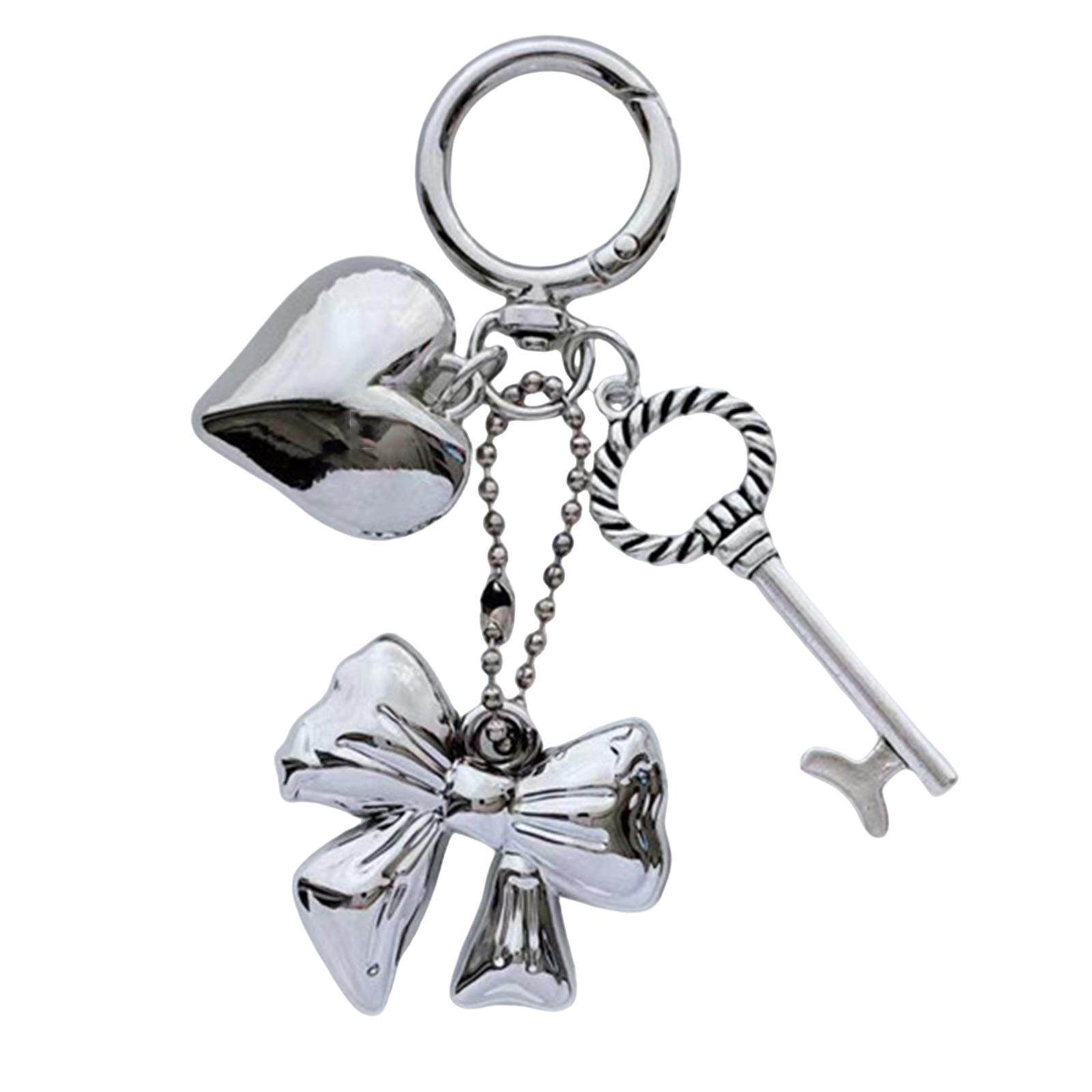 

Элегантная сумка для телефона в форме сердца, модный серебристый брелок-бантик с подвеской в виде сердца, уникальный аксессуар-брелок