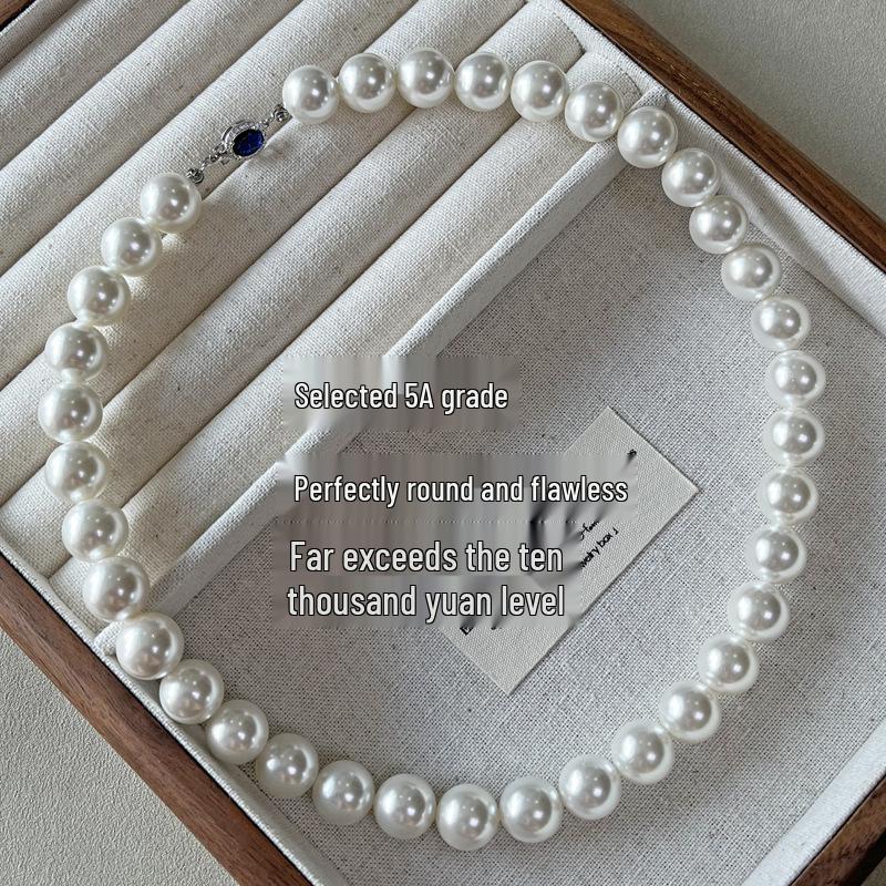 Natural Mother-of-Pearl Necklace with 925 Silver Sapphire Clasp, High Luster Shell Pearls, and Australian White Pearls.