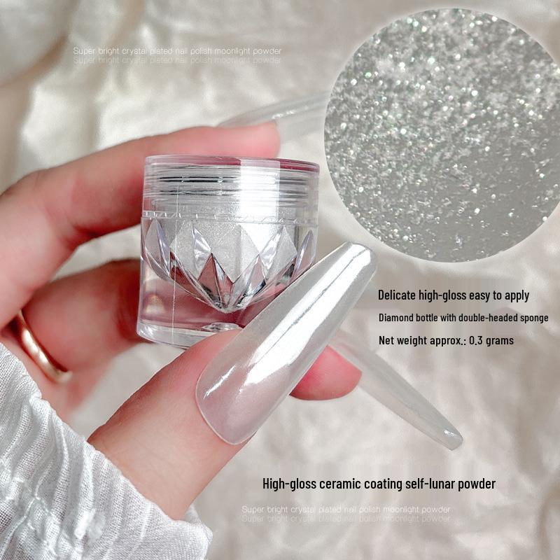 Aurora Nail Art Powder: Upgraded Crystal Coating with White Magic Mirror Effect for Easy Application and Super Bright Silver Finish.