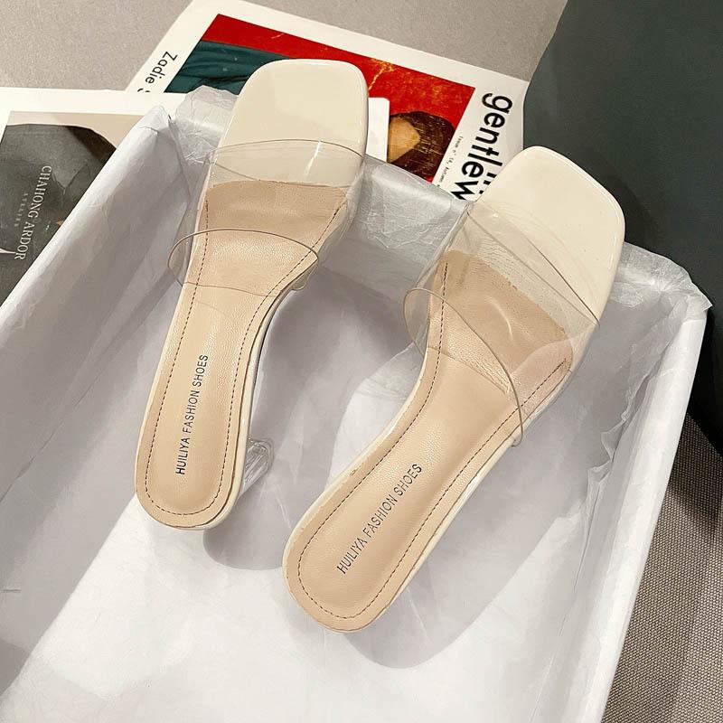 Wear high-heeled slippers 2025 women's spring one-word open-toed transparent crystal thick-heeled cool slippers show height