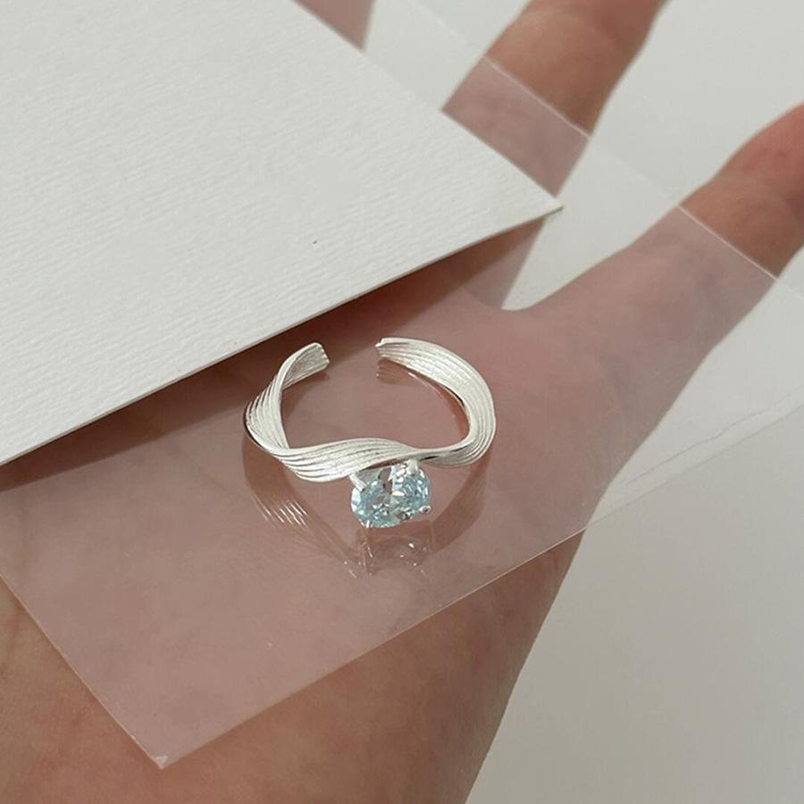 

Distinctive Zircon Blue Copper Ring For Women Featuring Wave Design In Elegant Fashion