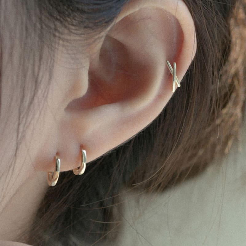 youngglow 14k cross x piercing