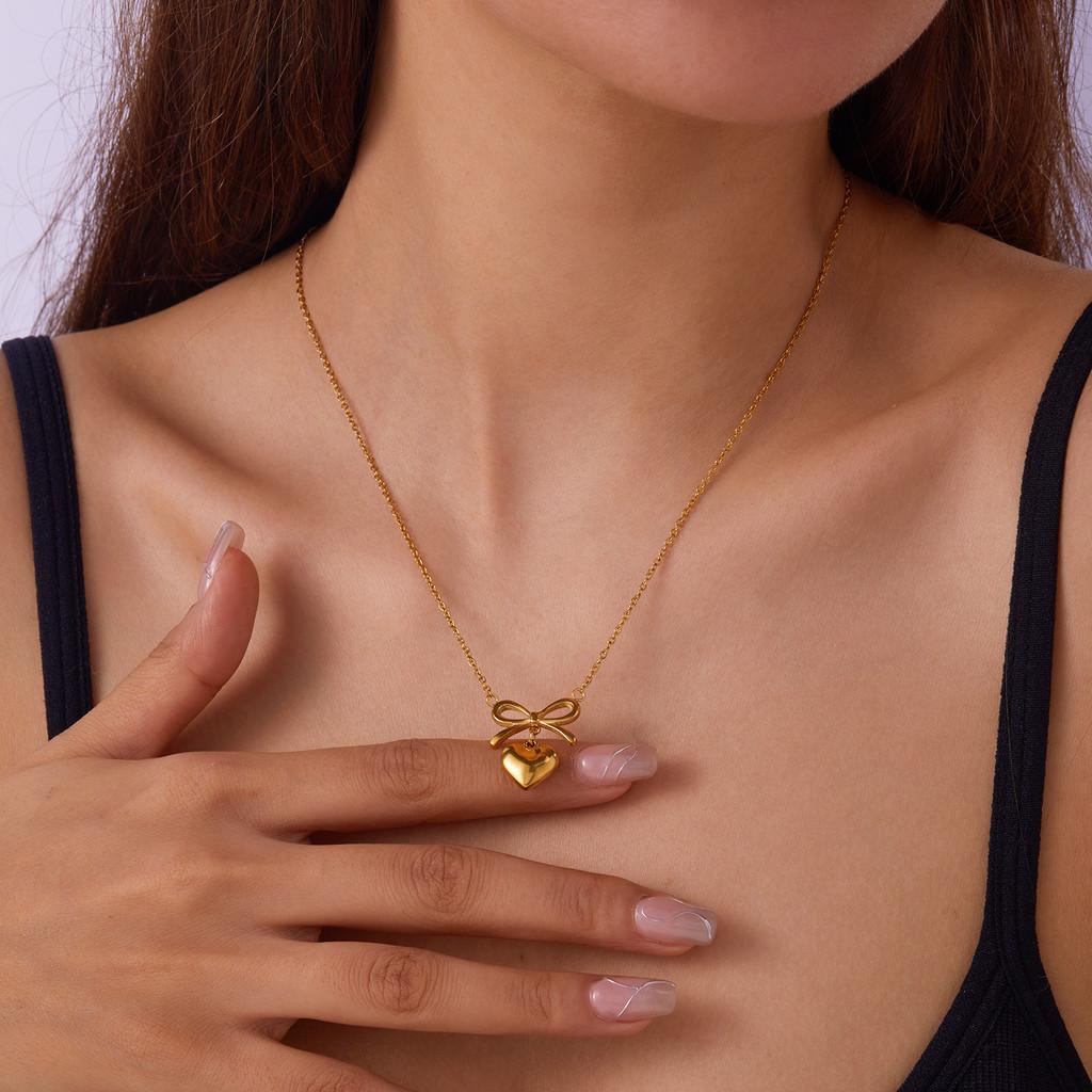 Elegant Heart Shape Pendant Necklace With Butterfly Bow Design In Stainless Steel For Daily Wear