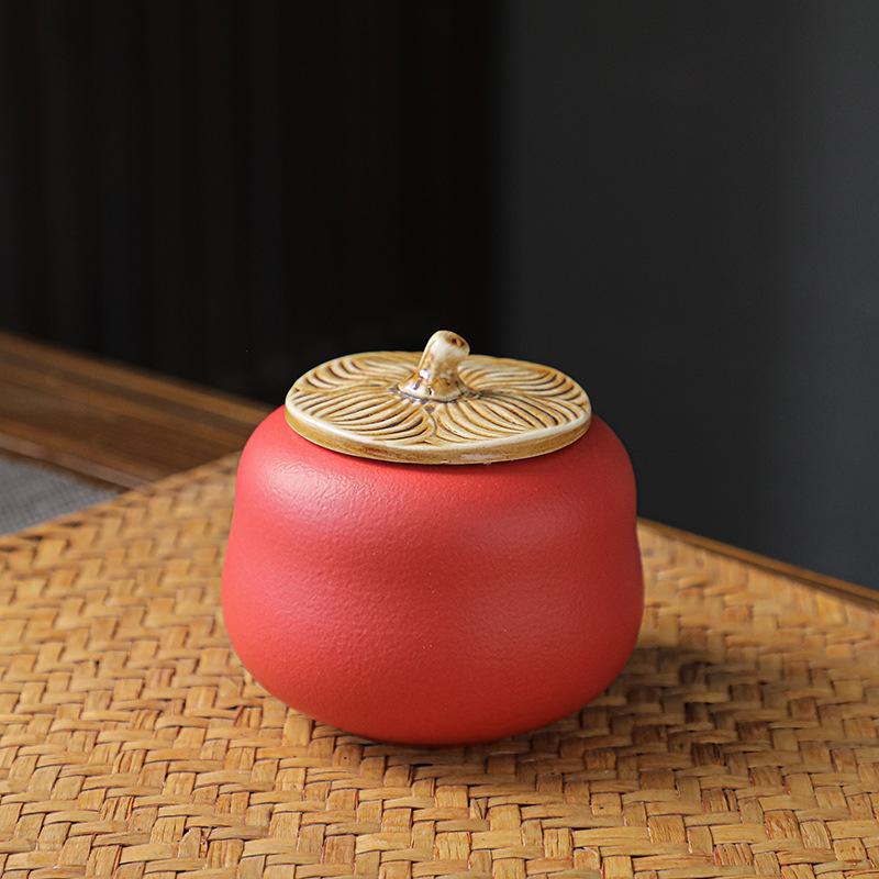 

High-grade ceramic tea can, sealed, portable size, household travel persimmon tea can, everything persimmon Ruyi jar