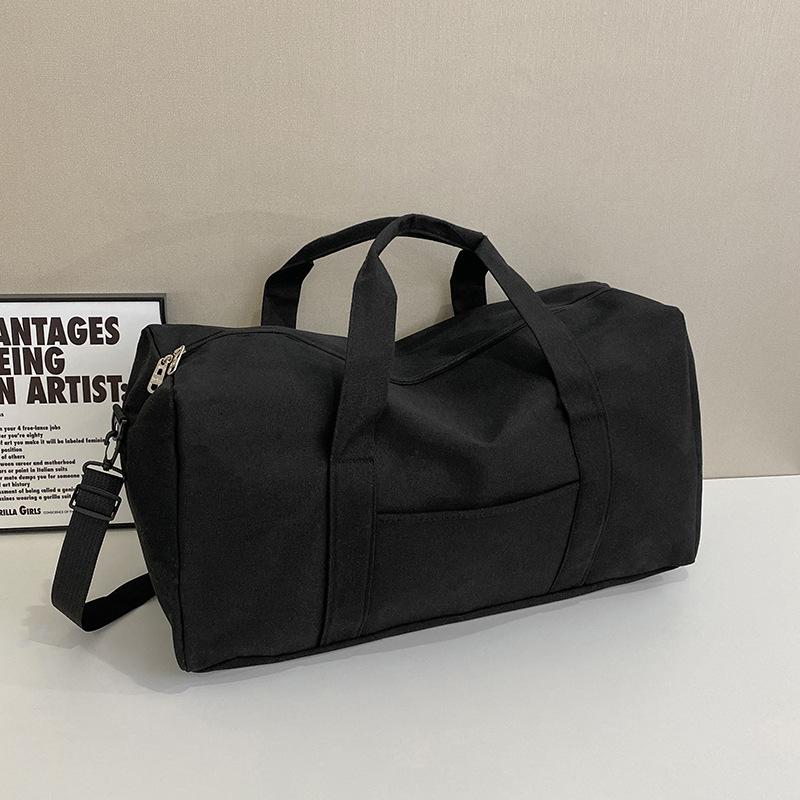 Thickened and sturdy canvas travel bag, moving bag, duffel bag, handbag, business trip travel bag, large capacity, long and short-distance bag.