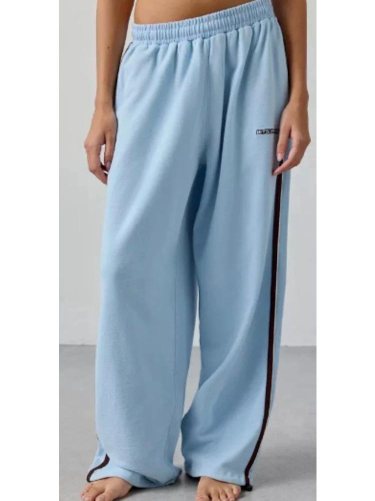 Pantaloni Sportivi da Donna Rosa Chiaro a Gamba Larga con Striscia Laterale e Vita Elastica