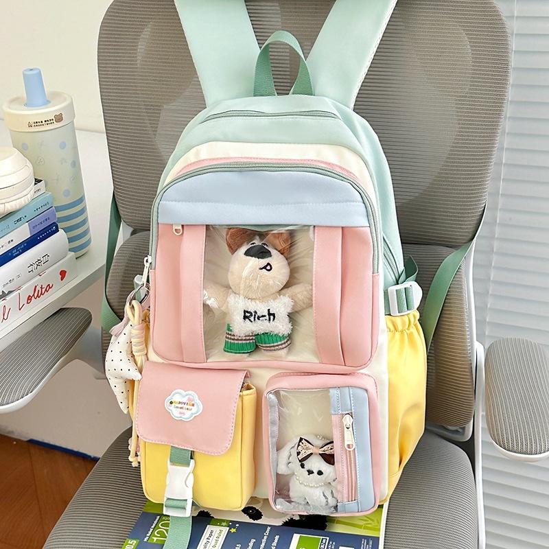 Schoolbag schoolbag Korean version of girls cute bear doll canvas backpack large capacity sweet junior high school backpack