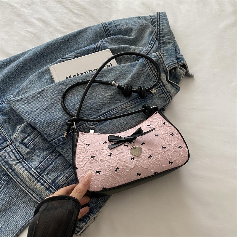 

Niche design bow underarm bag women s new handbag fashion shoulder messenger bag sweet baguette bag рожевий