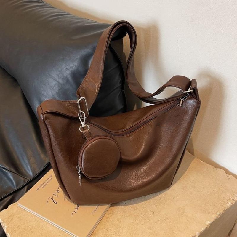 

Large capacity high value bag women s versatile new fashion niche design wide shoulder strap shoulder bag crossbody dumpling A