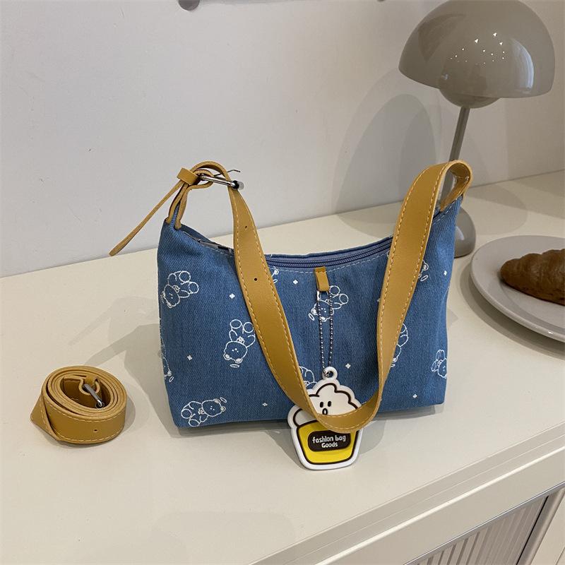Cute printed casual armpit bag, fashionable and versatile women's messenger bag, light and textured portable shoulder bag, high value.