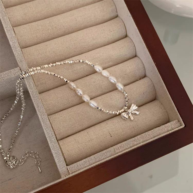 Elegant Silver Freshwater Pearl Bow Necklace: Light Luxury Fashionable Collarbone Chain