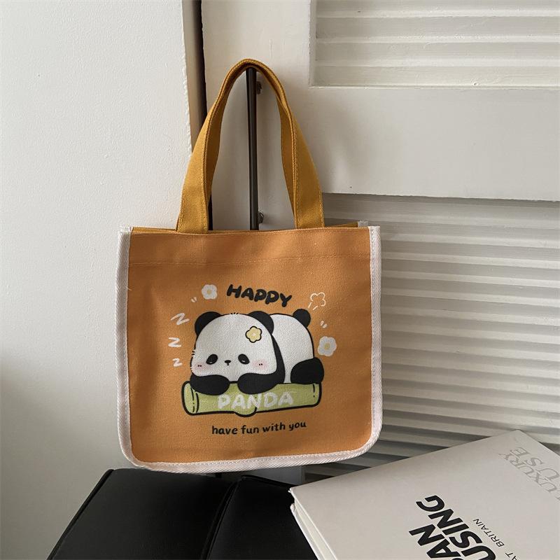 

Рисунок медведя 2025 новая холщовая сумка для бэнто женская на плечо сумка-тоут мультяшная простая сумка для занятий простая сумка жёлтый