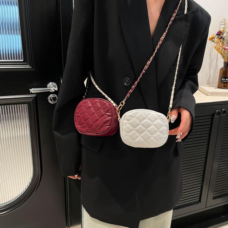 Handytasche mit strukturierter Rhombuskette, neues Nischendesign, Wechseltasche, modischer Temperament-Crossbody-Schulter-Rundbeutel