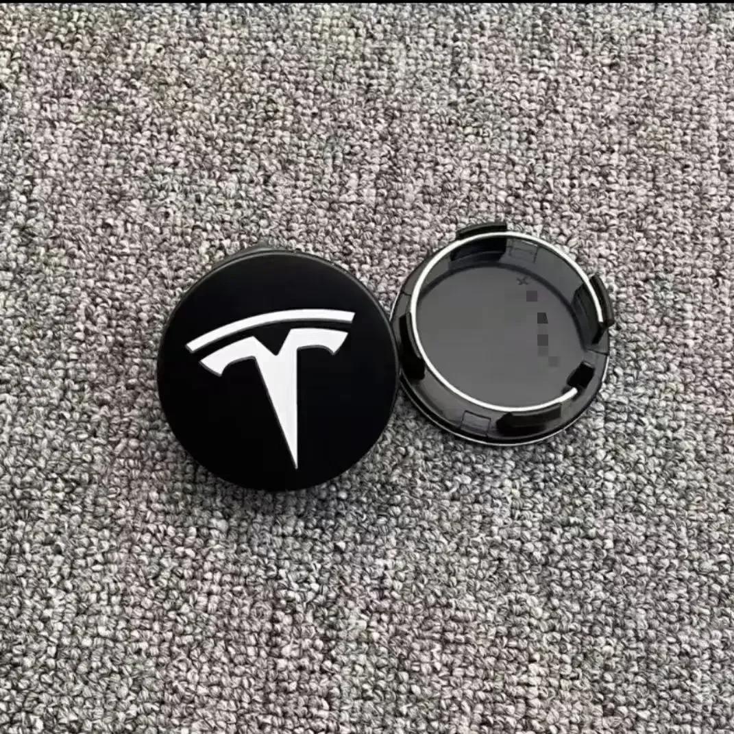 

Автомобильная наклейка 2025 Новый Tesla 56 мм Декоративная крышка ступицы колеса для Tesla Model 3 Y S X Центральная наклейка на колесо автомобиля Защита гаек колеса 4pcs center caps
