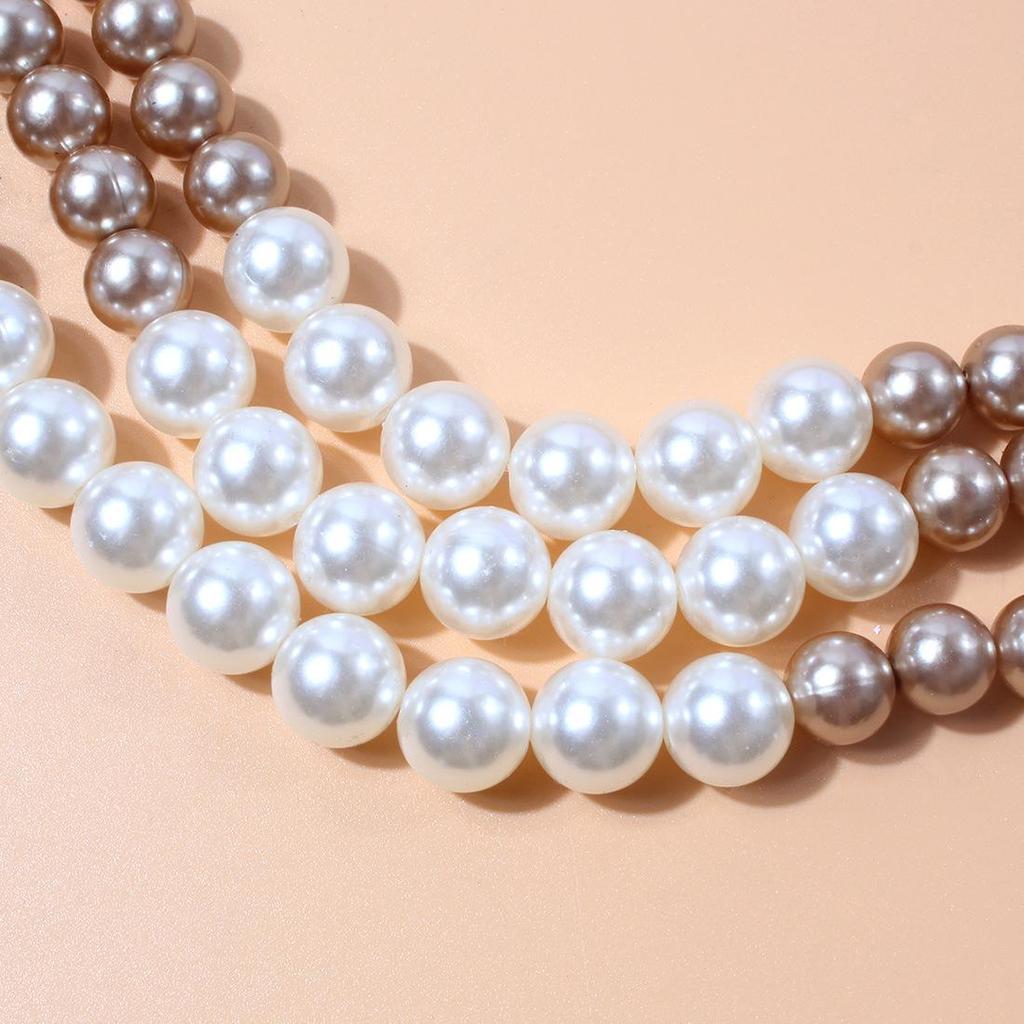 Europäische und amerikanische mehrlagige Modeschmuck-Halskette mit Imitationsperlen - Doppellagige Pulloverkette mit Kreuzanhänger