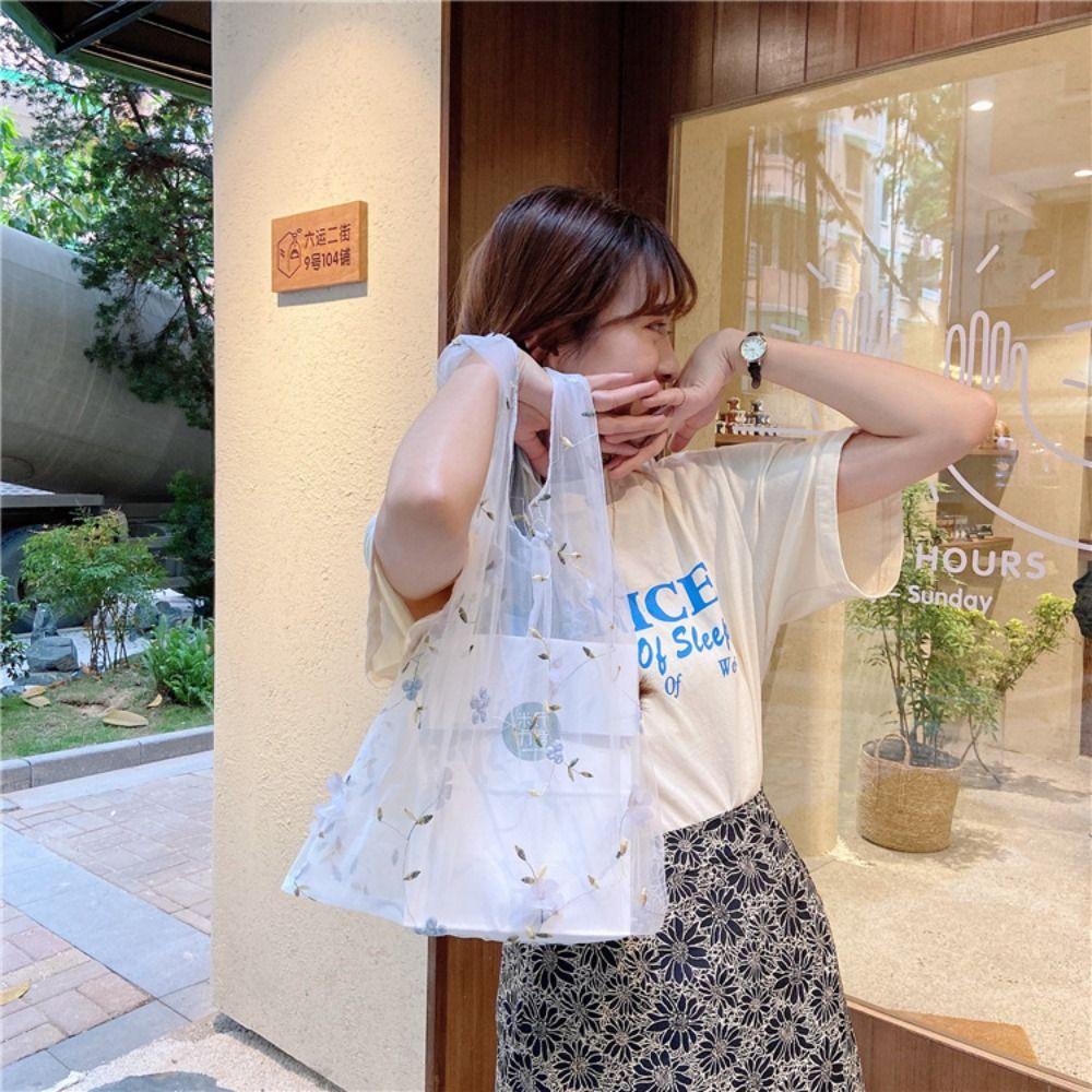 

Прозора сумочка великої місткості. Сумка для покупок у вигляді квітів. Повсякденна сумка з вишивкою. Дорожня бежевий