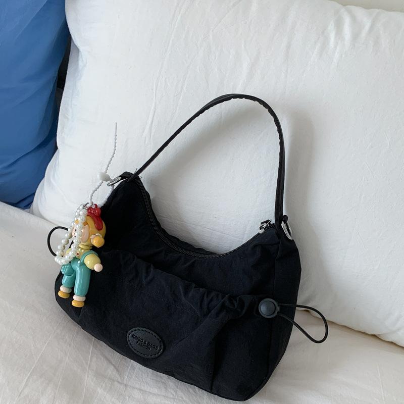 

Niche dumpling bag new casual messenger bag women s fashion simple high-end texture shoulder bag single bag (no pendant added) чорний