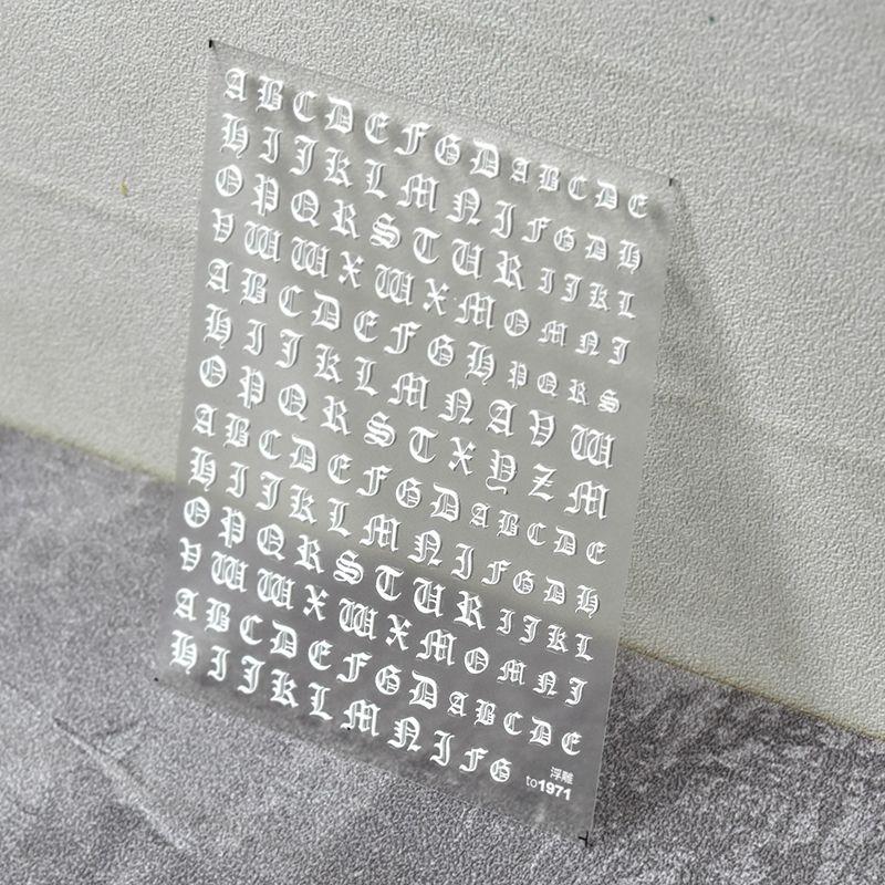 

Black and White Tomoni Embossed Adhesive Nail Sticker White Letter 1971