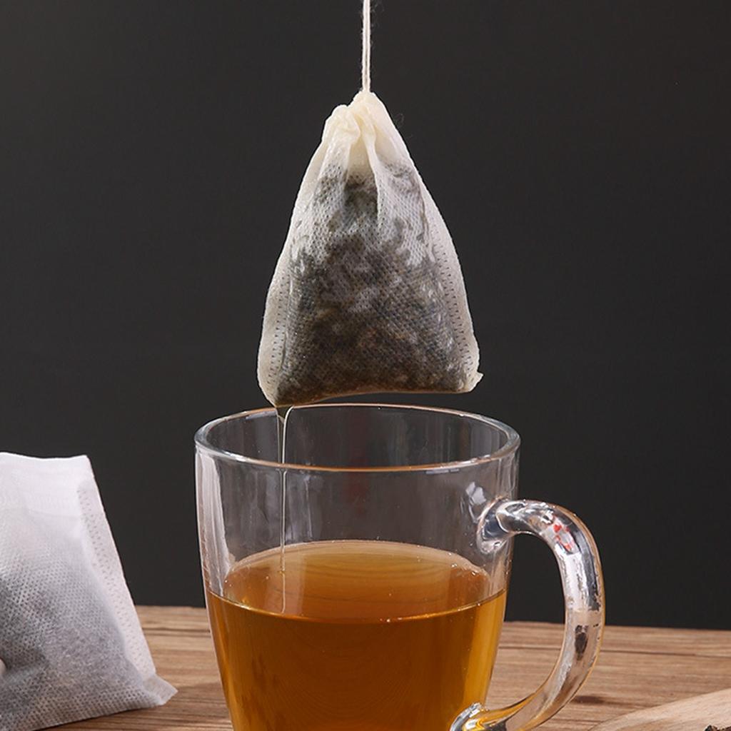 100pcs Disposable Tea Bags Non-woven Fabric Tea Filter Bags with Drawstring Filter Paper Teabags for Loose Leaf Tea Herb Teaware