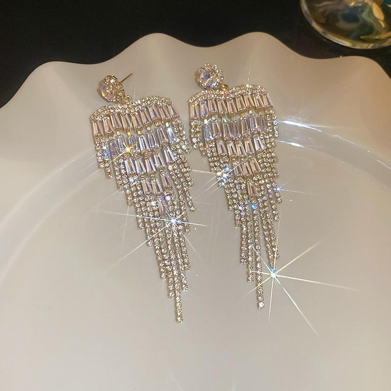 Silver needles are super shiny with zirconium flowers, fringed stud earrings, women s exaggerated earrings, temperament earrings.
