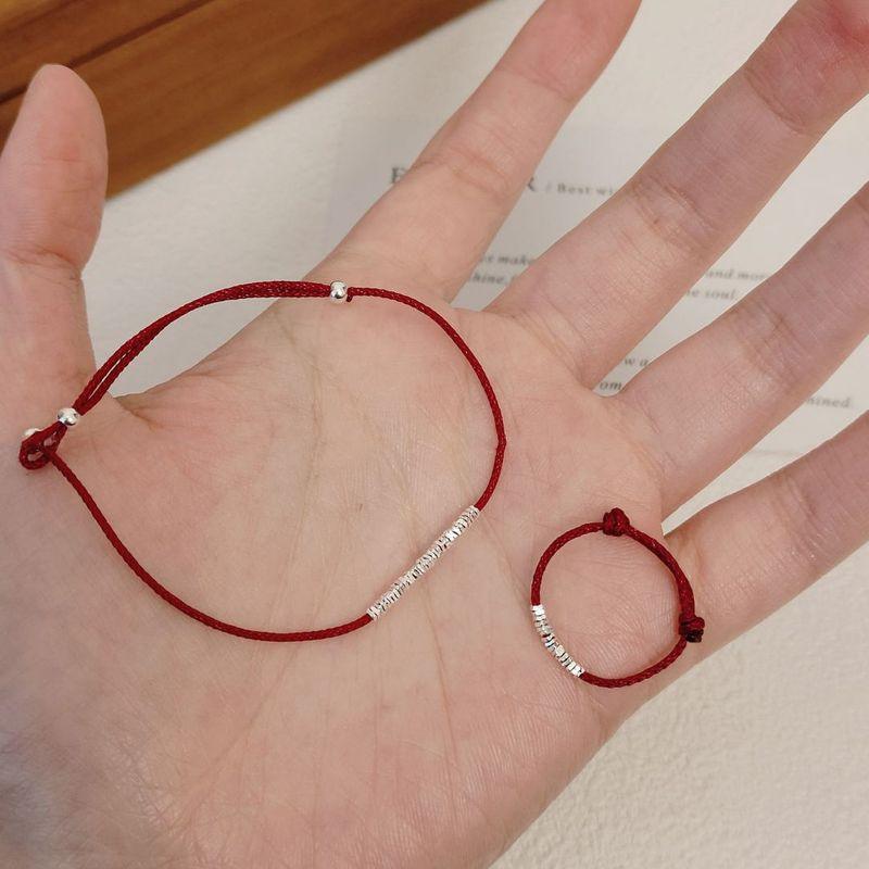 

Серебро S925 Мелкие серебряные элементы Этот год животного Браслет из красной веревки Цепочка на запястье Простой плетеный вручную дизайн Регулируемый браслет пуш-пул Ring Red