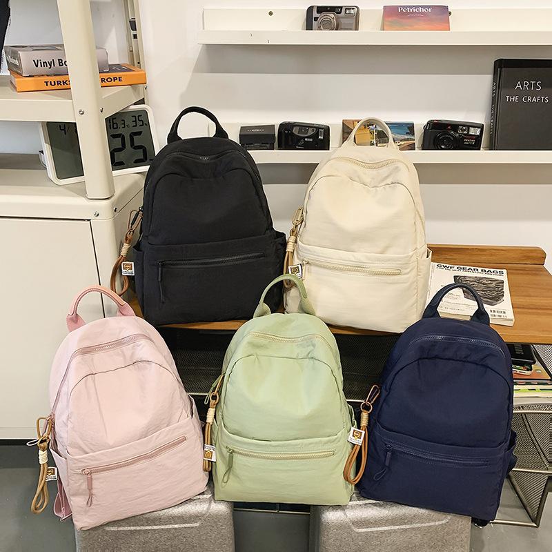 Školní batoh ve stylu college Dámský jednobarevný velkokapacitní batoh na dojíždění Pánský lehký batoh