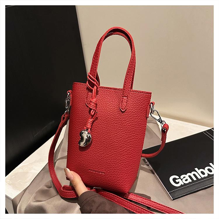 

2025 новая сумка женская летняя простая модная универсальная корейская ретро продвинутой текстуры на плечо кроссбоди сумка-ведро красный