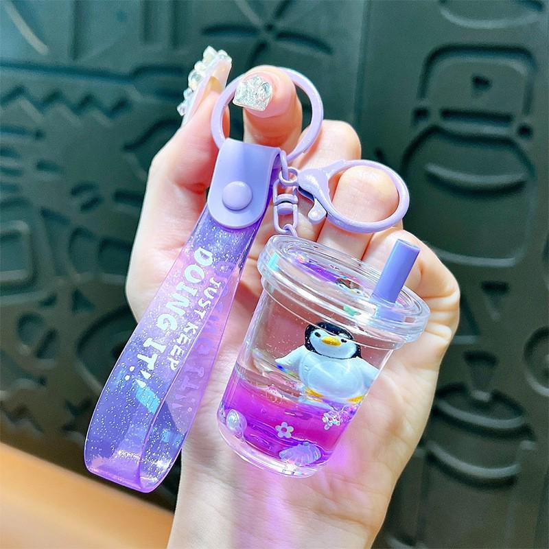 Exquisite Quicksand Panda Keychain: Cartoon Oil-Filled Doll Bag Pendant and Car Accessory