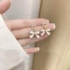 2025 Pearl Bow Stud Earrings: Trendy Minority Design for Women - Ear Clips & Accessories