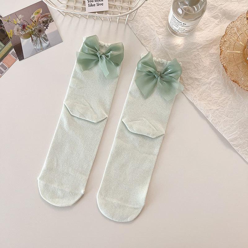 

Трендовые носки для студенток в стиле Лолита, однотонные носки из хлопка для женской осени и зимы, носки до середины икры с бантом-конфетой 1 pair зелёный