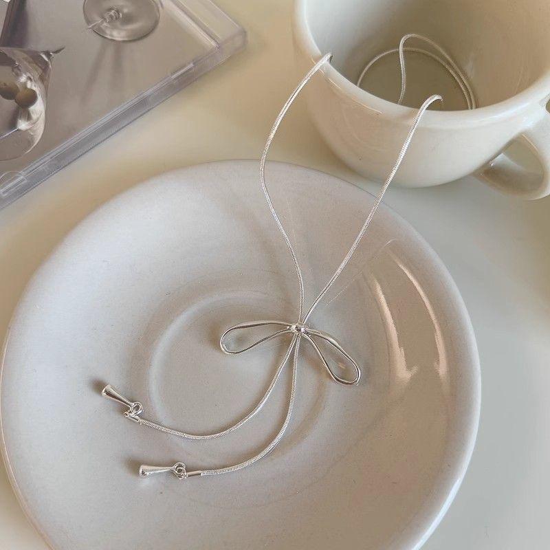Silver bow pull necklace female simple cold style long accessories Korean fashion temperament collarbone chain