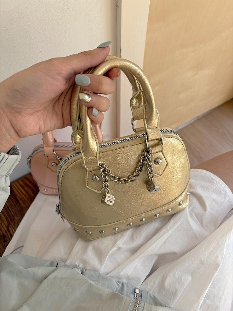 New niche design high-end champagne thousand gold rivets portable shell small bag fashionable single shoulder oblique span bag
