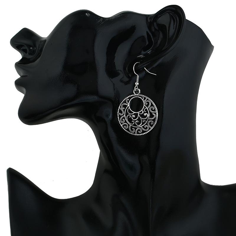 Tibetan Ethnic Earrings: Retro Hollow Pattern from Nepal & Yunnan