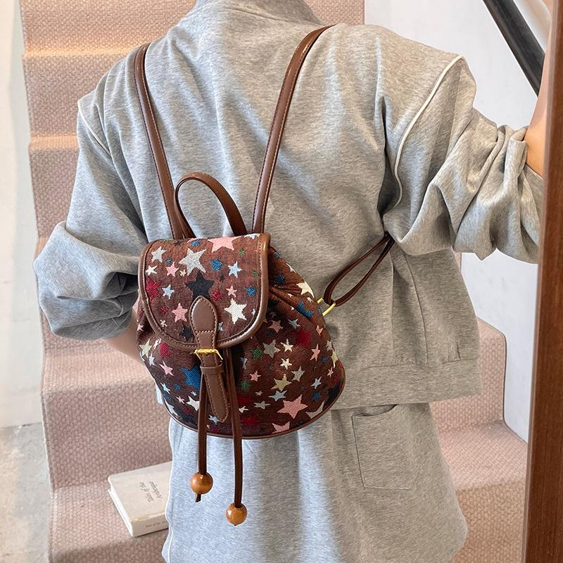 Bag 2025 new Korean version fashion printing casual commuting small schoolbag women's foreign style versatile travel backpack