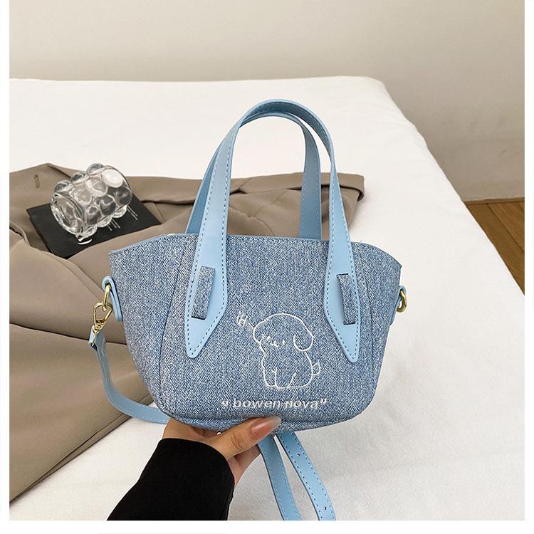 

2025 high-end sense tote bag women s personality versatile contrasting colors Korean version niche temperament portable shoulder messenger women s bag синий