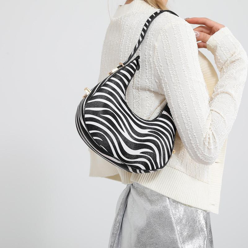 Schicke und einzigartige Umhängetasche für Damen mit Zebra-, Leoparden- und Kuhmustern