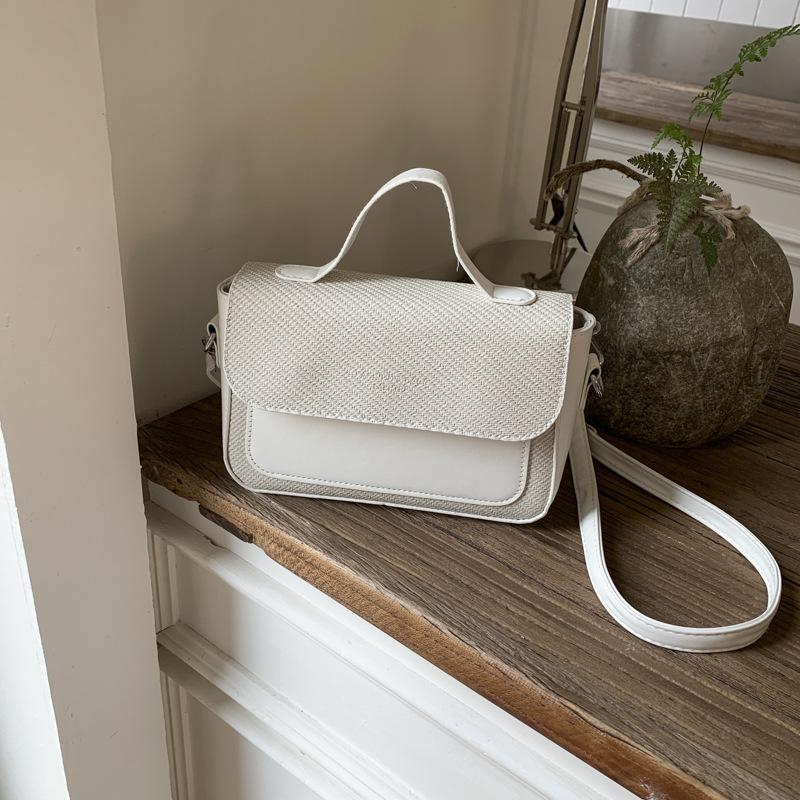 

New high-end portable women s bag niche design fashion bag versatile commuter shoulder messenger bag белый