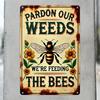 "Pardon Our Weeds, We're Feeding the Bees" Tin Sign - Rustic Floral Wall Art - Durable Iron, Easy-to-Hang - Ideal for Gardens