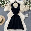 French white sleeveless knitted dress women's summer new cold hollow waist thin A-shaped skirt thousand gold style