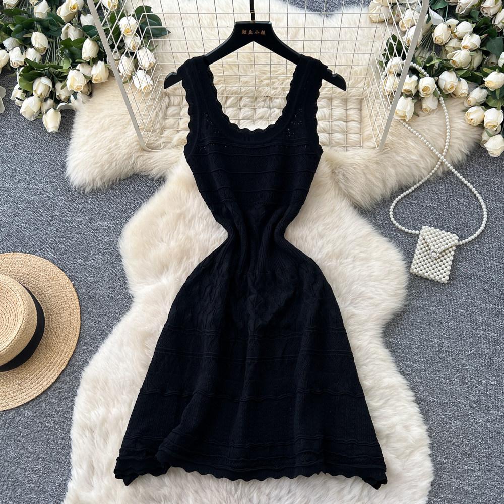 French white sleeveless knitted dress women's summer new cold hollow waist thin A-shaped skirt thousand gold style