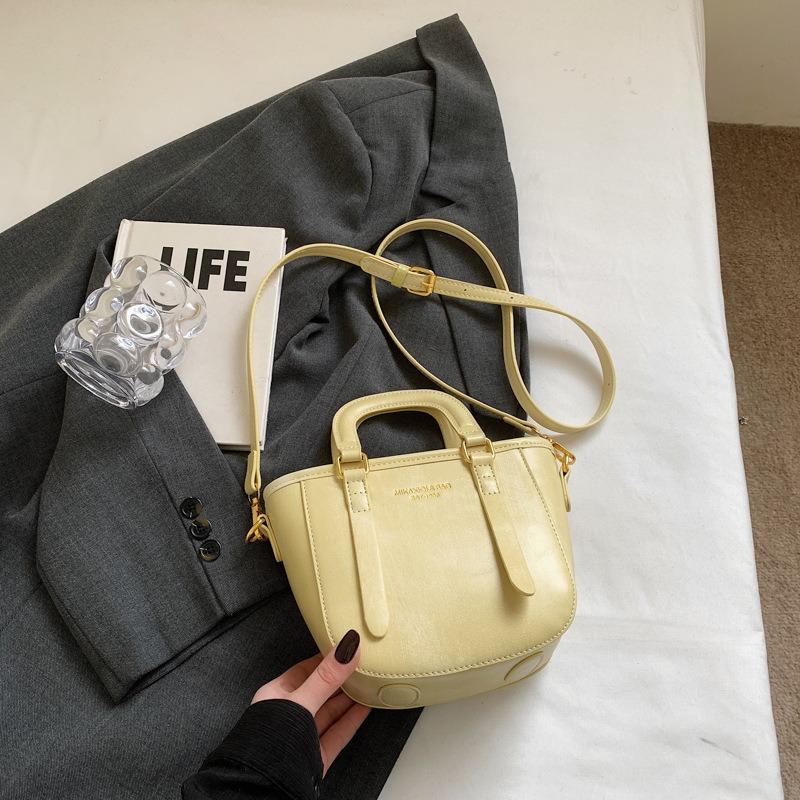 

Simple bucket bag women s fashion hand bag summer new niche high-end versatile women s bag