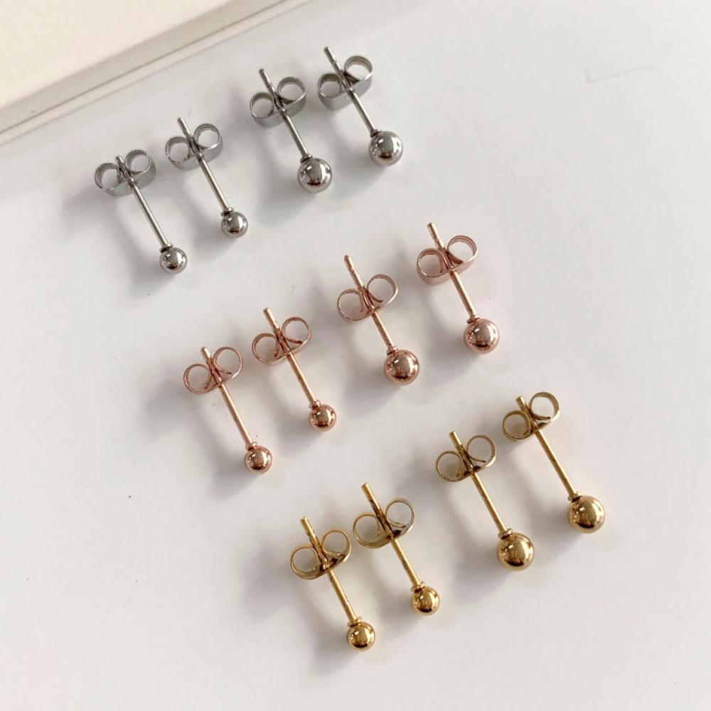 

Набор из 4-х цветных серег-гвоздиков Blue City 1+1 с шариками розового золота, золота и серебра